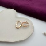 گوشواره طلا حلقه‌ای دو رنگ | طراحی بیضی با طلای زرد و رزگلد